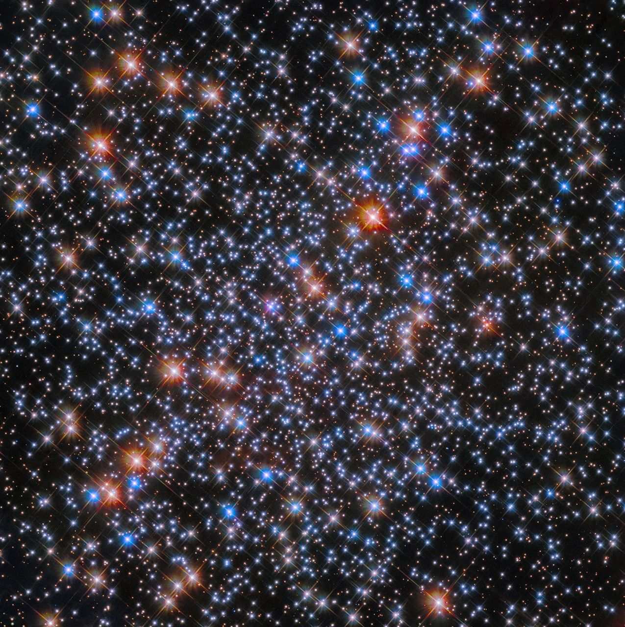 White, blue, orange, and red stars are scattered throughout the scene.